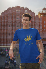 blue t-shirt featuring gold crown words Child-of-God on a man