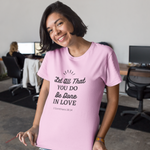 woman wearing pink t-shirt with black letters saying Let All That You Do Be Done in Love 1 Corinthians 16:14