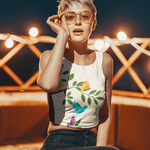 Woman wearing cropped tank with tree branch and three birds