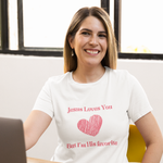 smiling woman wearing white t-shirt with pink lettering saying Jesus loves you but I'm his favorite and pink crayon heart 