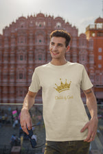 natural t-shirt featuring gold crown words Child-of-God on a man