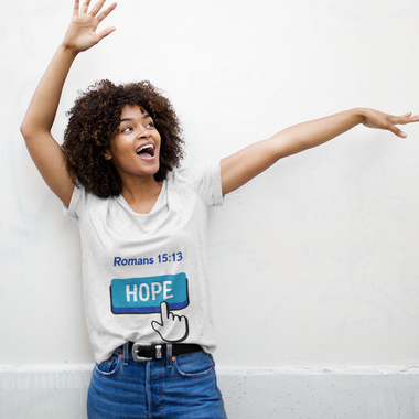 Woman with blue hope button short-sleeve t-shirt in white with white finger clicking and Romans 15:13 above