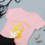 pink t-shirt with gold words saying "When you live for the God of Glory you will see the Glory of God" and picture of white dove with white cross and flames