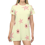 woman wearing Pale yellow all-over print short sleeve dress with pink flowers and stars front view