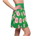 Woman wearing green skater skirt with pink rose all-over-print